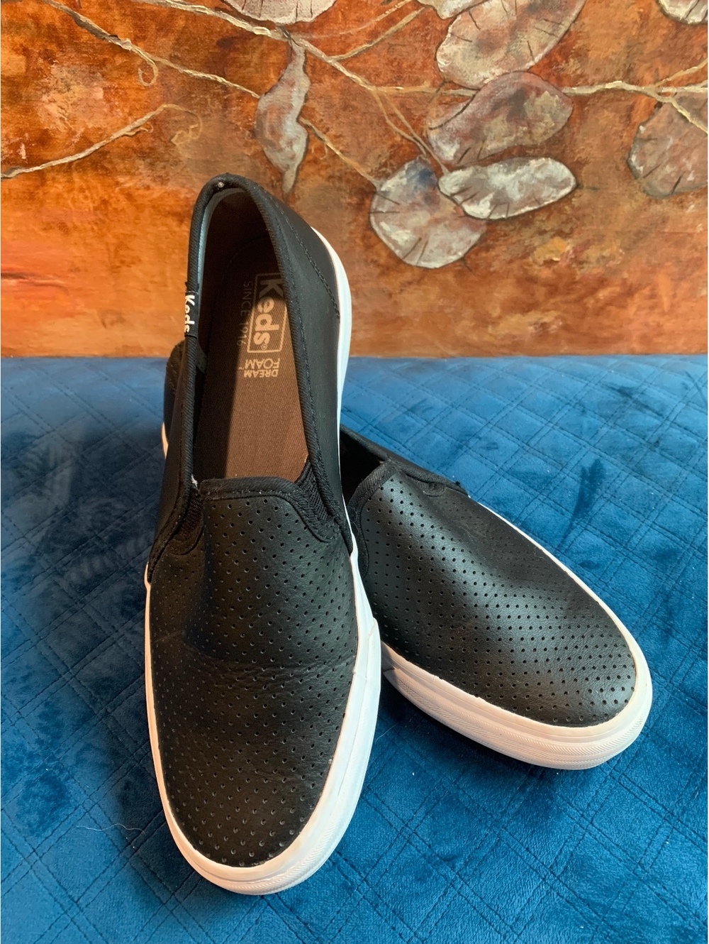 Keds Women's Black Perforated Slip-On Sneakers with White Soles, Size 8